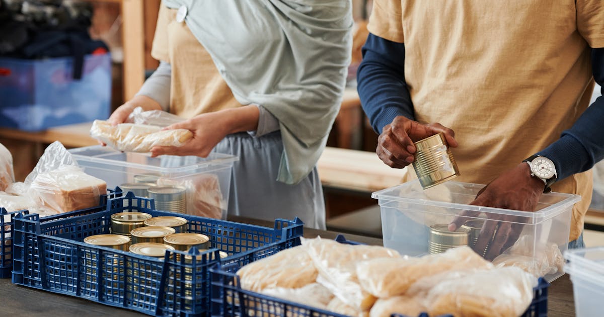 Volunteers preparing food representing the labour built into convenience products
