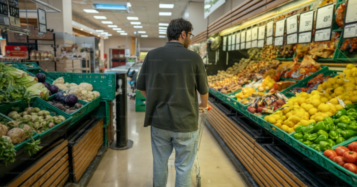 FreshCo and Walmart Canada storefronts side by side with price tags