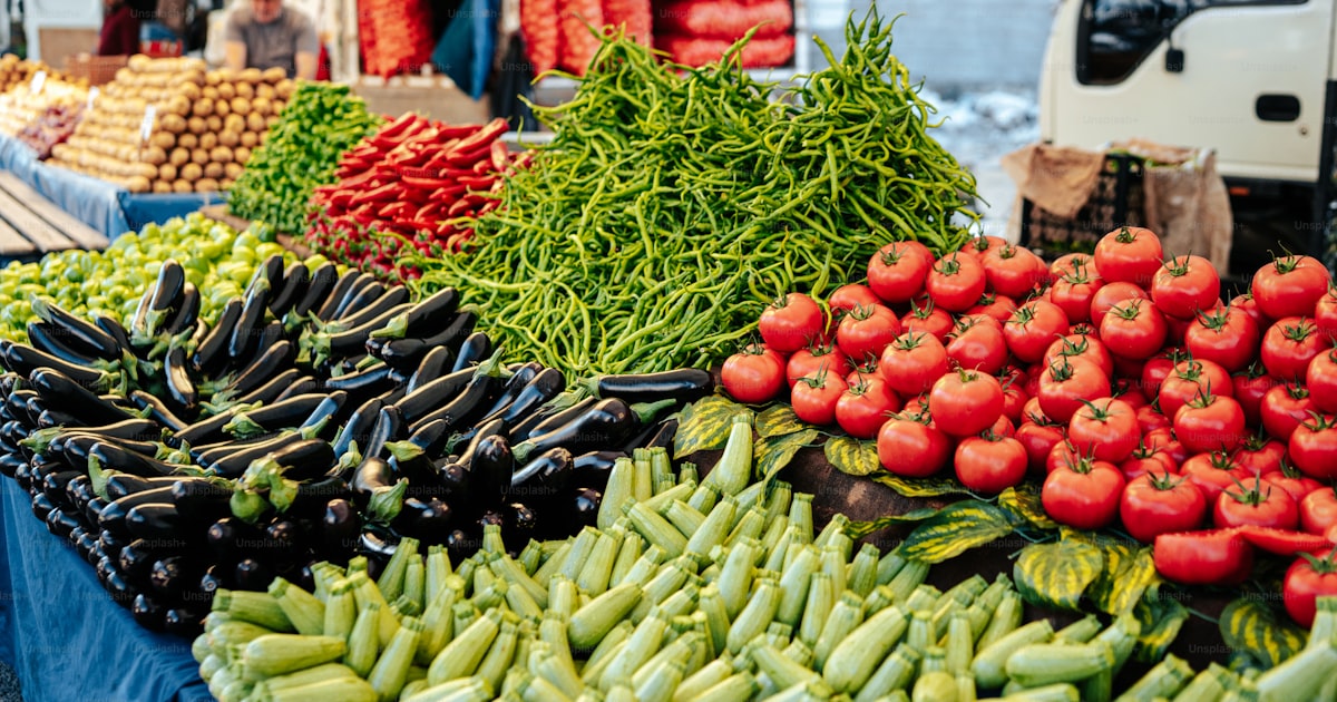 Canadian seasonal produce display with strawberries and apples